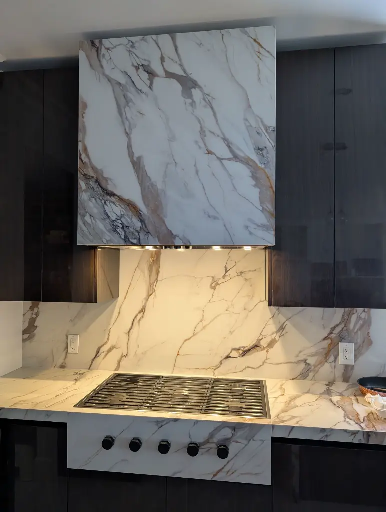 Calacatta Macchia Luna surface — Guava Quartz + Stone | Adam Stonetech (view 2)