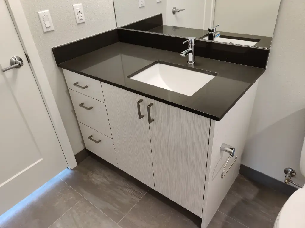 Pepper Slate surface — Guava Quartz + Stone | Adam Stonetech