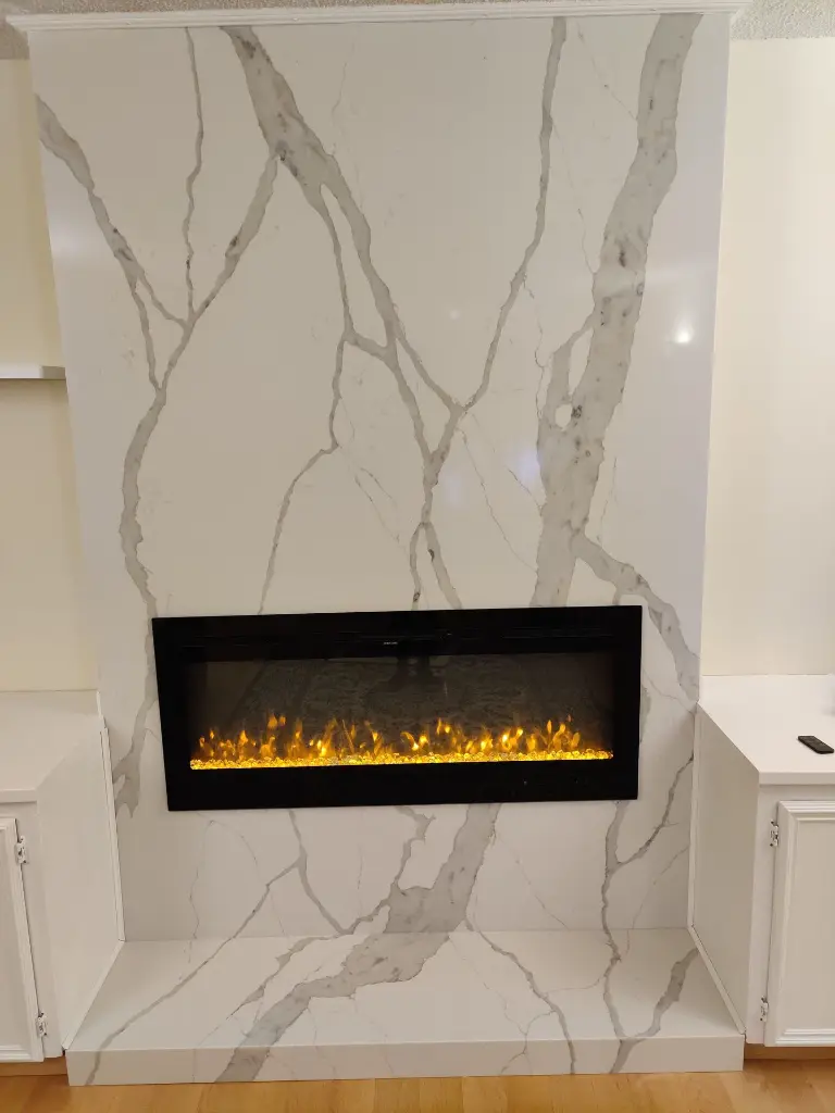 Statuario Scaligero surface — Guava Quartz + Stone | Adam Stonetech (view 1)